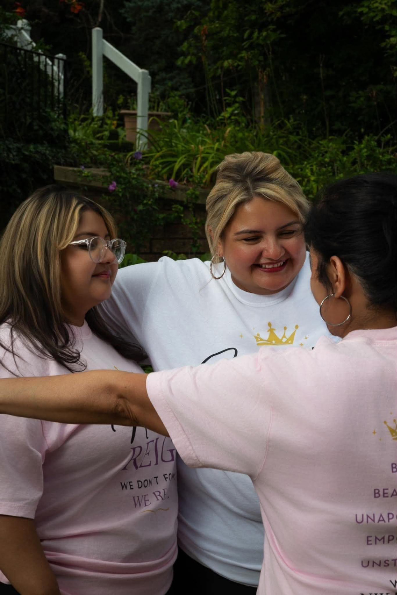 Women laughing and enjoying a Nika's Reign community experience